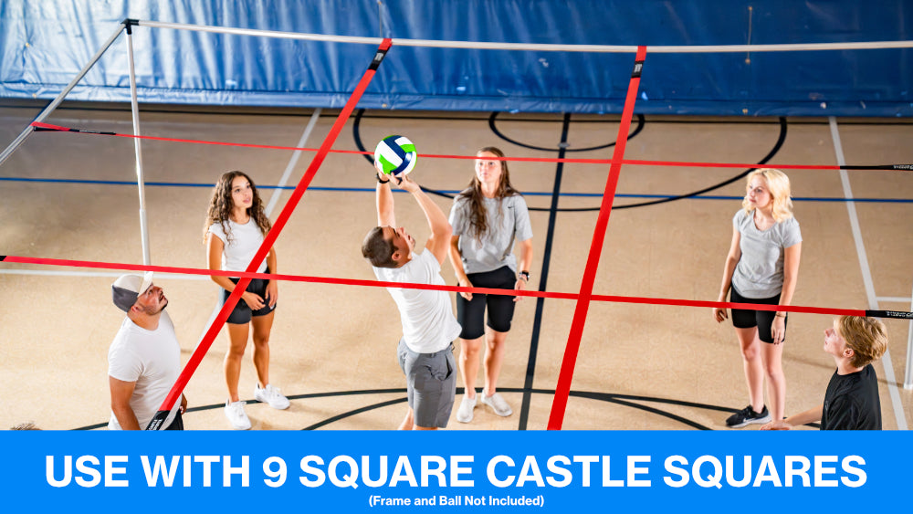 People playing 9 Square with red straps set up