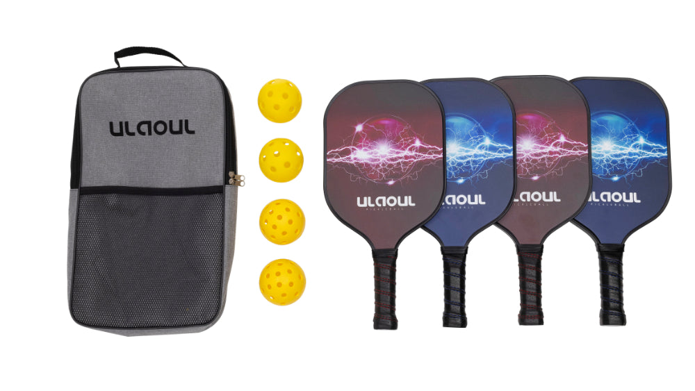 four graphite pickleball paddles, 4 balls, and a bag